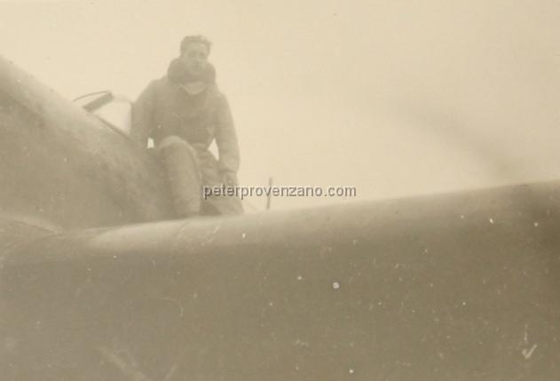 Peter Provenzano Photo Album Image_copy_060.jpg - Jim McGinni on the wing of a Hawker Hurricane I.  RAF Station Kirton Lindsey, February 1941.